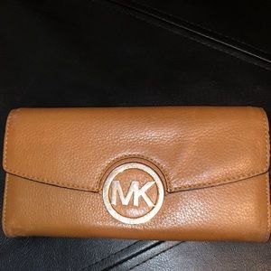 Leather camel brown Michael Kors wallet.